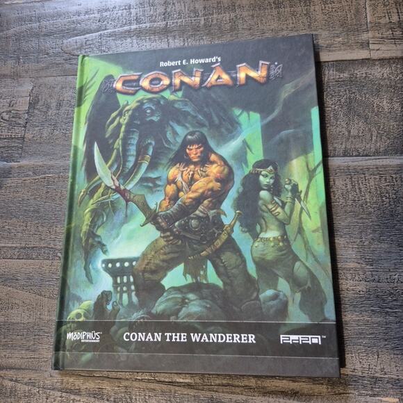 Modiphius Robert E Howard Conan Conan the Wanderer RPG Sourcebook 2d20 Hardcover - Picture 1 of 16
